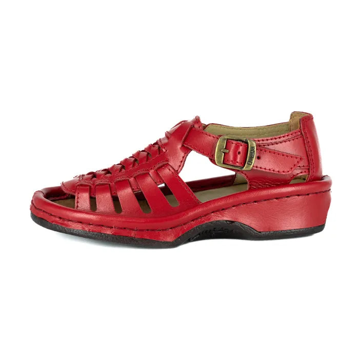 Red sandal with a buckle on a white background