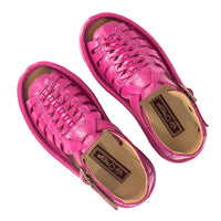 Pair of pink sandals on a white background