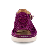 Purple sandal with a white sole on a white background