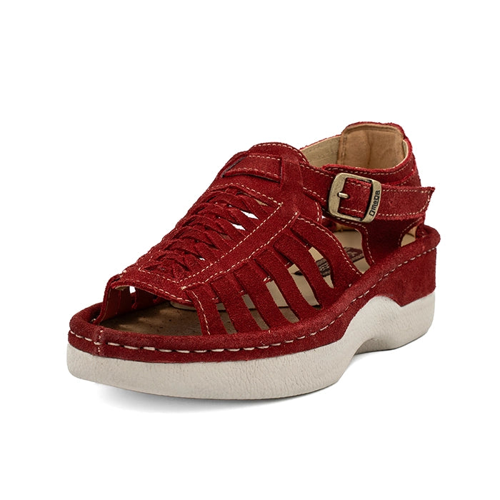Red sandal with a off white sole on a white background