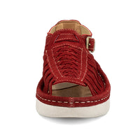 Red sandal with a off white sole on a white background