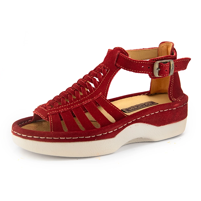 A single red suede wedge sandals with cutout straps, a buckle strap, and a beige sole, shown on a white background.