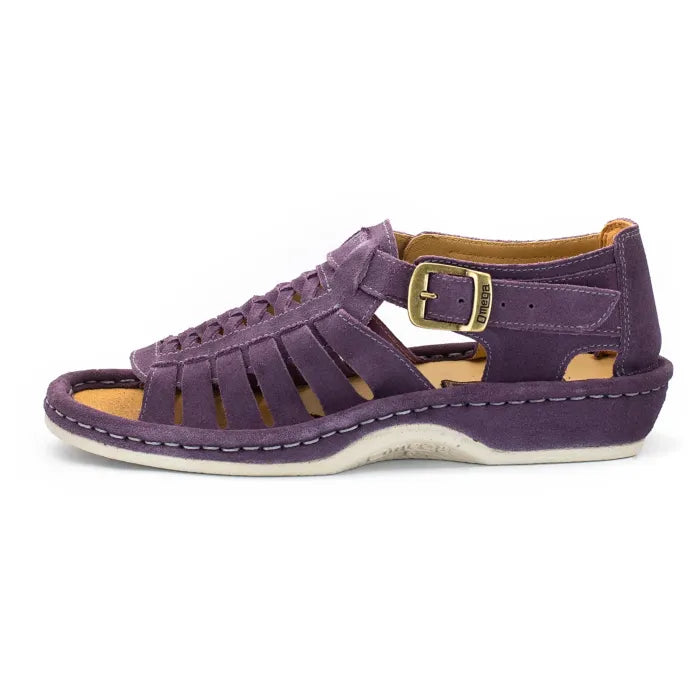 A shoe with strappy sandals in purple suede, featuring a cutout design, braided detail across the front, an adjustable ankle strap with a gold-tone buckle, and a low wedge heel. The brand 'Omega' is visible on the buckle.