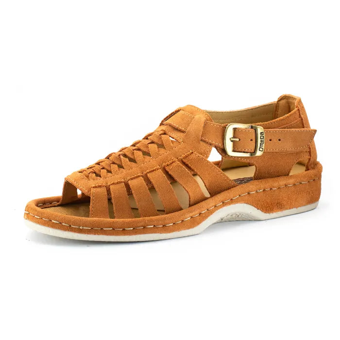A single sandal in peach coloured suede, featuring a multi-cut strap design, an adjustable ankle strap with a gold-tone buckle, and a thick white sole.