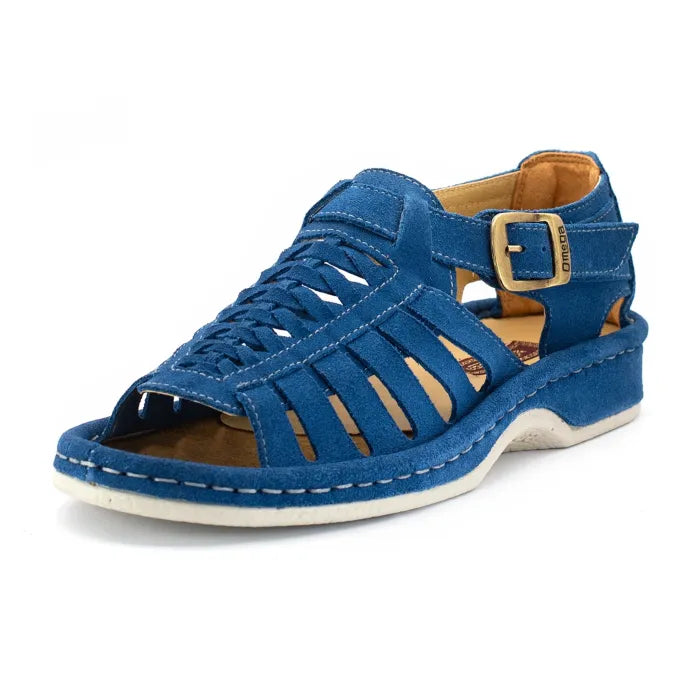 A single sandal in royal blue suede, featuring a multi-cut strap design, an adjustable ankle strap with a gold-tone buckle, and a thick white sole.