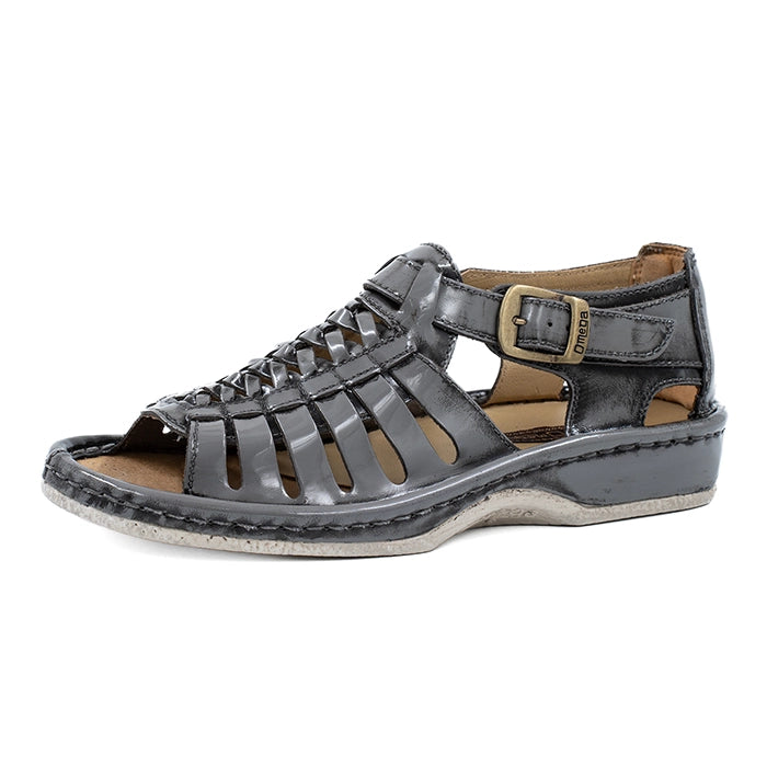 Grey sandal with a buckle on a white background