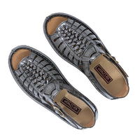 Pair of grey sandals with woven design on a white background