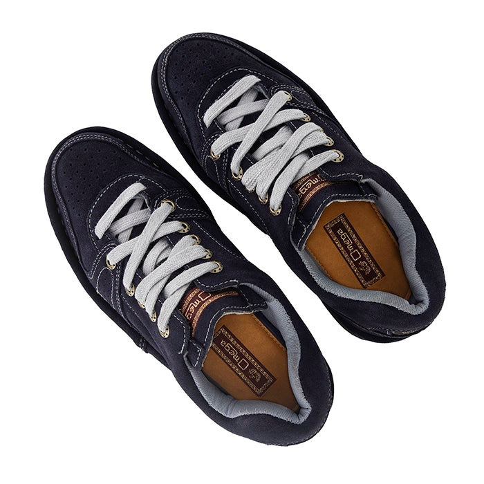 Pair of navy blue sneakers with grey laces on a white background