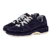 Pair of navy blue sneakers with grey laces on a white background
