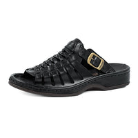 Black slip-on sandal with a gold buckle on a white background