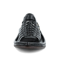 Black sandal on a white background
