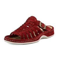 Red sandal with a off white sole on a white background