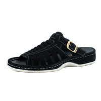 Black sandal with a off white sole on a white background