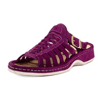 Purple sandal with a white sole on a white background