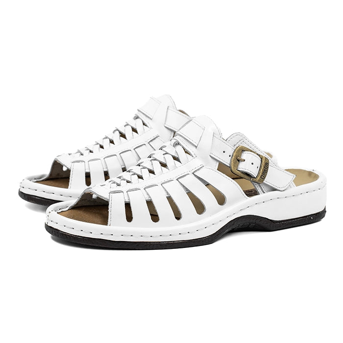 White sandals with a buckle on a white background