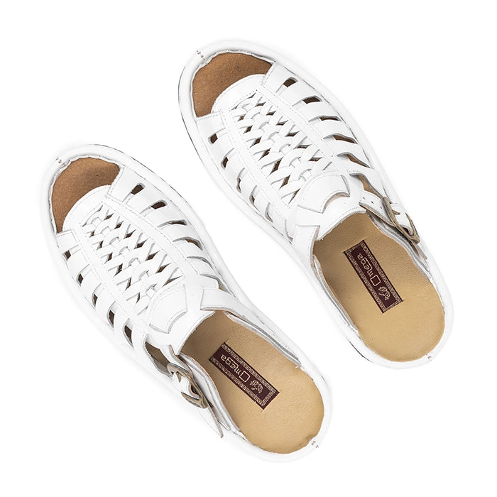 White sandals with brown soles on a white background