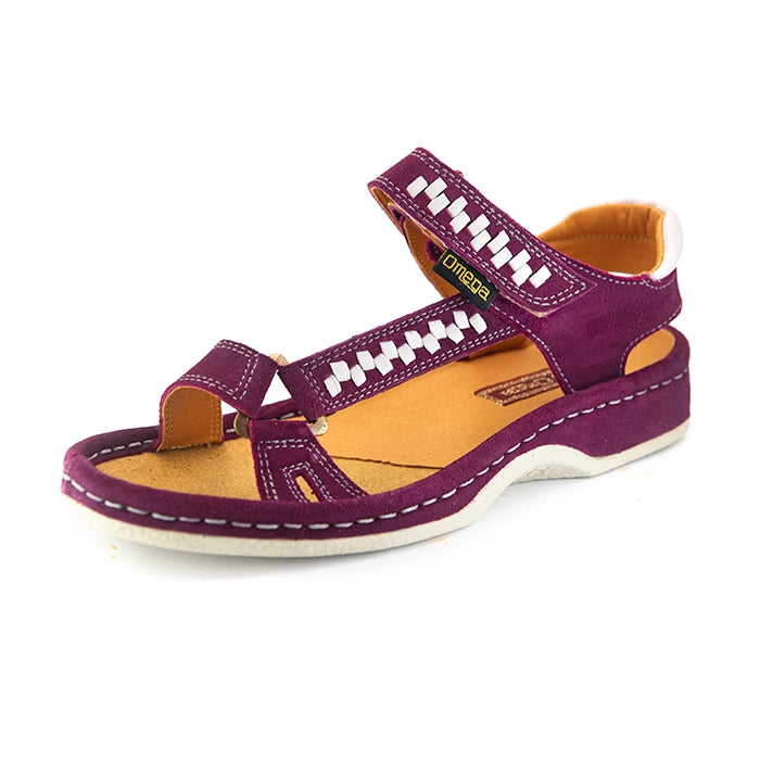 A single women's sandals in deep cerise suede with woven pattern details on the straps, a tan interior, and grey heel accents, shown on a white background.