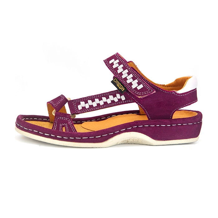 A single women's sandals in deep cerise suede with woven pattern details on the straps, a tan interior, and grey heel accents, shown on a white background.