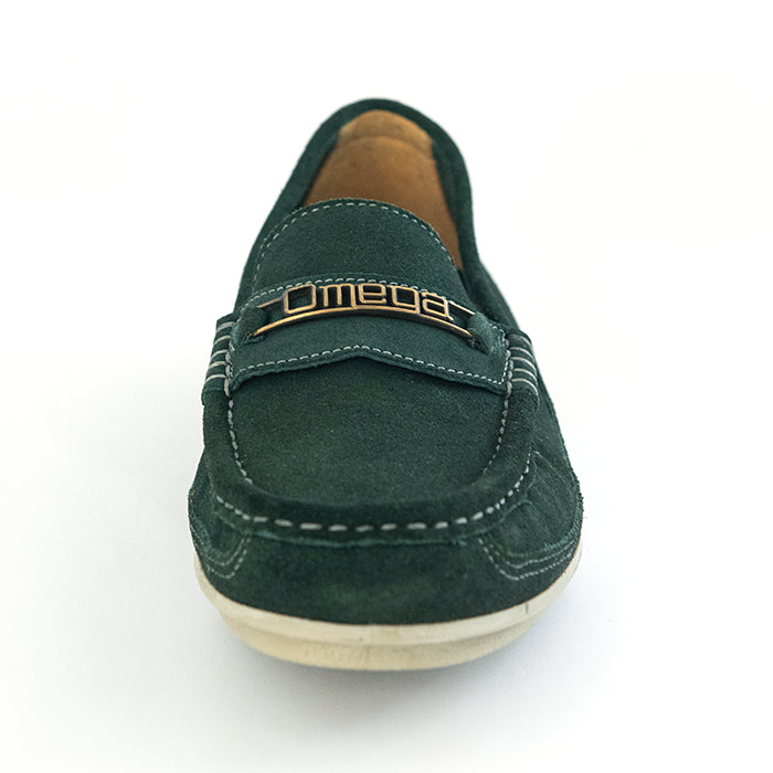 A dark green suede loafer shoe with a gold-tone metal 'Omega' logo on the strap, shown from a front-facing perspective on a white background.